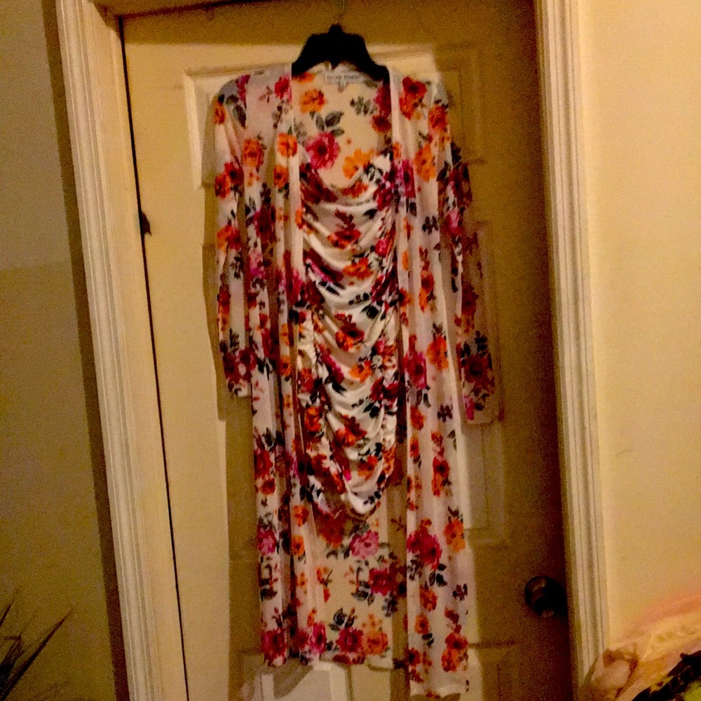A beautiful floral pint dress with matching length jacket.